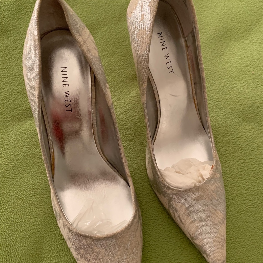 Silver and tan pumps